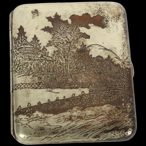 923 - A sterling silver cigarette case, with engraved pagoda decoration