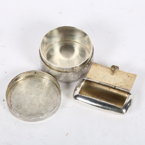 927 - A small ornate scrolled engraved circular silver box and cover, and a rectangular silver pillbox, of... 