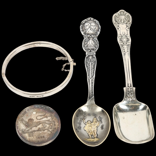 930 - A group of silver items, to include 2 sterling silver spoons, a silver bangle, boxed, and a cased si... 