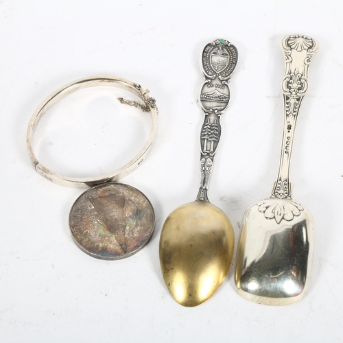 930 - A group of silver items, to include 2 sterling silver spoons, a silver bangle, boxed, and a cased si... 