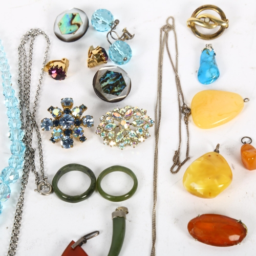 931 - A boxed of mixed jewellery, including amber, agate and turquoise pendants, silver and marcasite spra... 