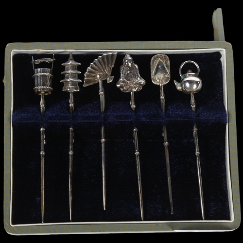 932 - A cased set of 6 Oriental sterling silver novelty cocktail sticks