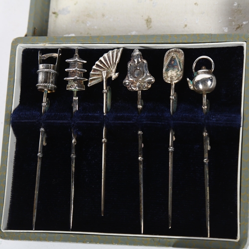 932 - A cased set of 6 Oriental sterling silver novelty cocktail sticks