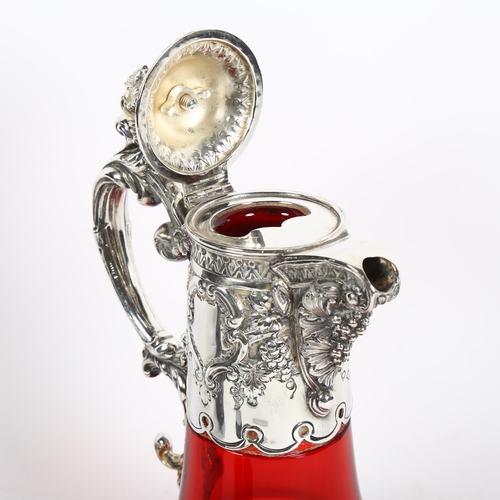 938 - A good quality 19th century silver plate mounted ruby glass Claret jug, with grapevine knop, 25cm