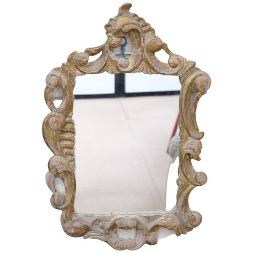 344 - Continental carved giltwood framed wall mirror, H63cm