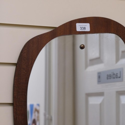 338 - A retro wall mirror mounted on wooden panel, H60cm