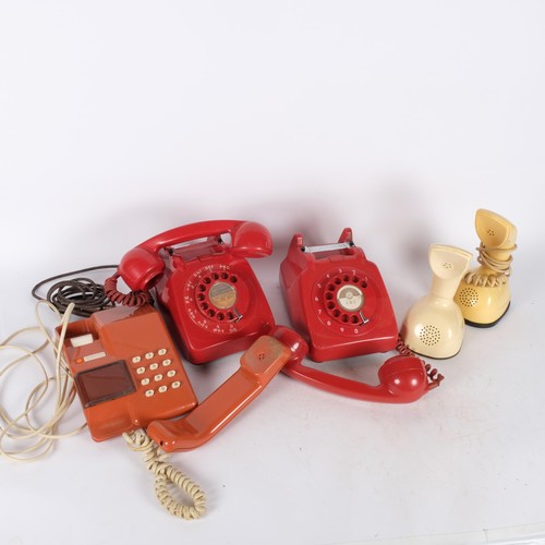 329 - 2 red 1960s dial telephones, and 3 others