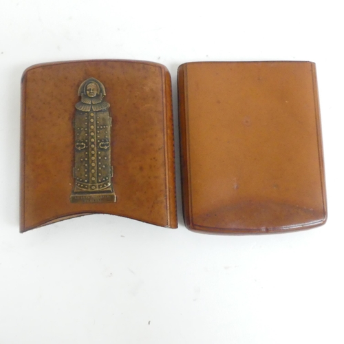 228 - A German leather cigar case, with applied erotic metal panel 