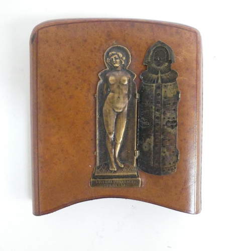 228 - A German leather cigar case, with applied erotic metal panel 