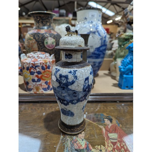 394 - A Chinese crackle glaze blue and white jar and cover, with 4 character mark, H22cm, and a Chinese va... 