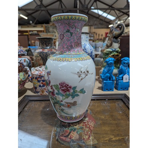 394 - A Chinese crackle glaze blue and white jar and cover, with 4 character mark, H22cm, and a Chinese va... 