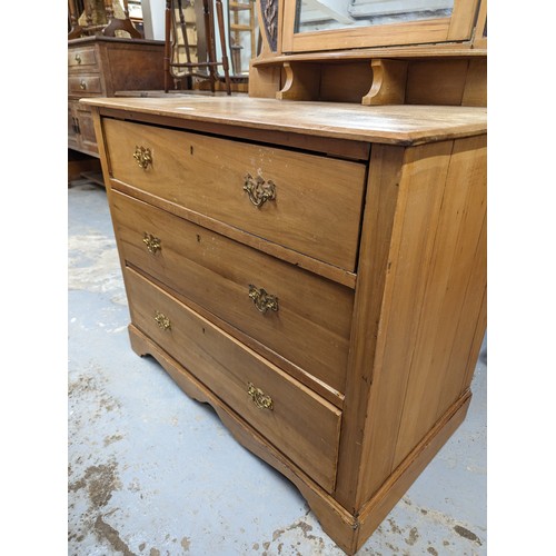 2509 - A pine Arts & Crafts style three drawer dressing chest with raised mirror back, 92x142x55cm, a pine ... 