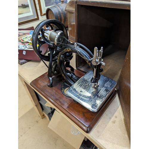 539 - WILLCOX & GIBBS SEWING MACHINE COMPANY, NEW YORK - an Antique Willcox & Gibbs portable sewing machin... 