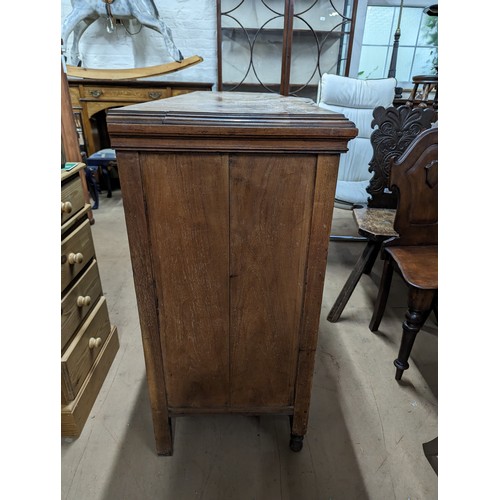 2134 - A mahogany Art Nouveau style sideboard, with four drawers, three cupboards and carved foliate decora... 