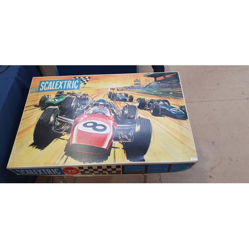 499 - A boxed Scalextric Grand Prix 75 set