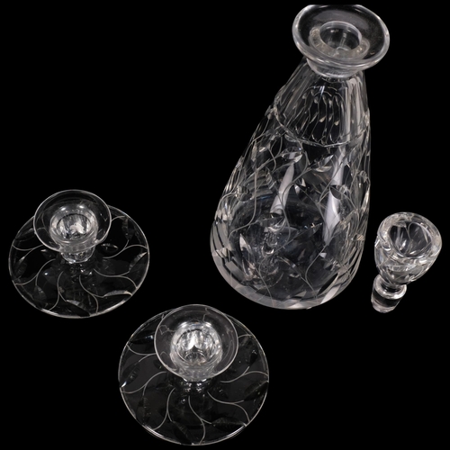 61 - CLYNE FARQAURSON(1906-78), two cut glass candlesticks and a similar leaf pattern decanter, candlesti... 