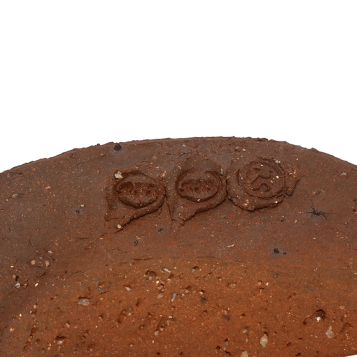 104 - PETER SMITH (b.1941-), Bojewyan Pottery,  British, a studio pottery textured dish with abstract slip... 