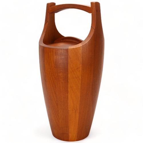 124 - JENS QUISTGAARD for Dansk Designs, an early “Congo” large size ice bucket in staved teak with an ora... 