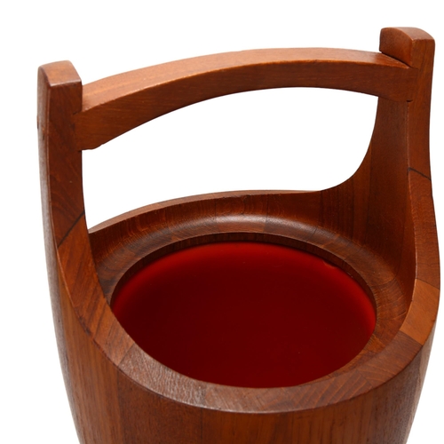 124 - JENS QUISTGAARD for Dansk Designs, an early “Congo” large size ice bucket in staved teak with an ora... 