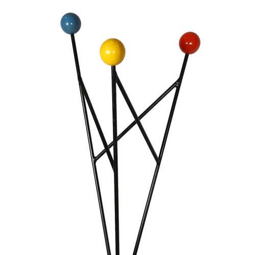 140 - ROGER FERAUD, France, a mid-century coat stand in wrought iron with coloured wooden ball terminals, ... 