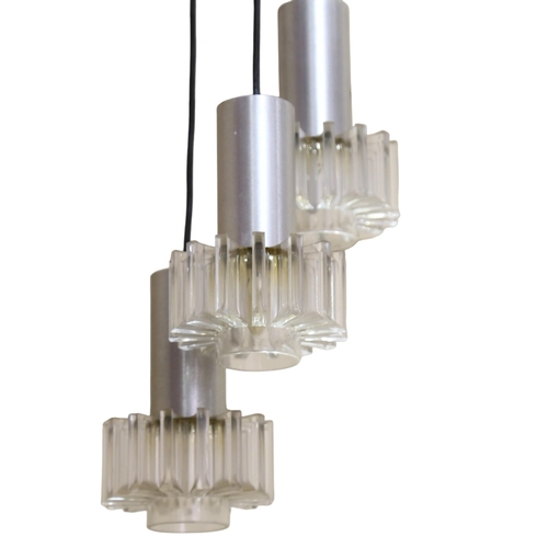 142 - A 1970s' three branch pendant ceiling light fitting, with acrylic star shades and aluminium covers, ... 