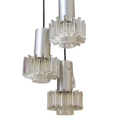 142 - A 1970s' three branch pendant ceiling light fitting, with acrylic star shades and aluminium covers, ... 