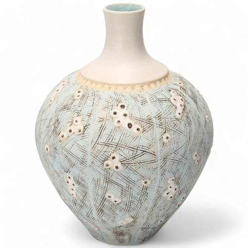 144 - A porcelain studio pottery vase with sgraffito decoration and matt glaze, makers mark to base JB?, h... 