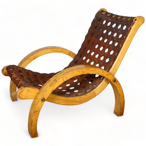 158 - A mid-century French woven leather lounge chair in the Art Deco manner, height 80cm, width 66cm, dep... 