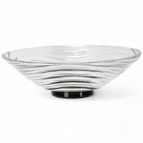 161 - SIMON GATE for Orrefors, a large 1930s' wave pattern clear glass bowl on black foot, marked to base,... 