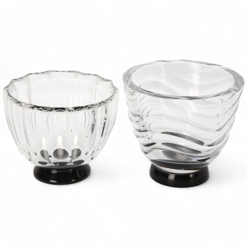 163 - SIMON GATE for Orrefors, Sweden, two 1930s clear glass bowls on black foot, both with makers mark to... 