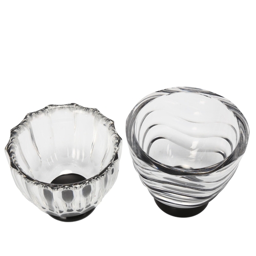 163 - SIMON GATE for Orrefors, Sweden, two 1930s clear glass bowls on black foot, both with makers mark to... 