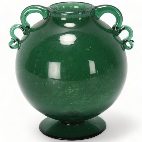 171 - WILLIAM STENBERG for Gullaskruf glass factory, Sweden, a 1930s' green glass globe vase on a flared b... 