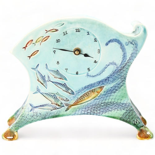 184 - MARY MCFADDEN, British, a studio ceramic quartz clock with fish decoration, impressed maker mark, he... 