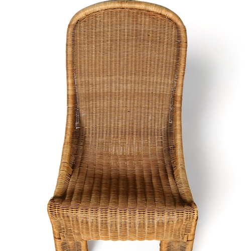 27 - A 1950s' French wicker chair in the manner of Louis Sognot, height 86cm