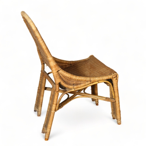 27 - A 1950s' French wicker chair in the manner of Louis Sognot, height 86cm