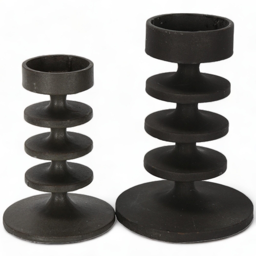 64 - ROBERT WELCH, a pair of 1970s cast iron candlesticks, Design Centre and makers labels, tallest 17cm