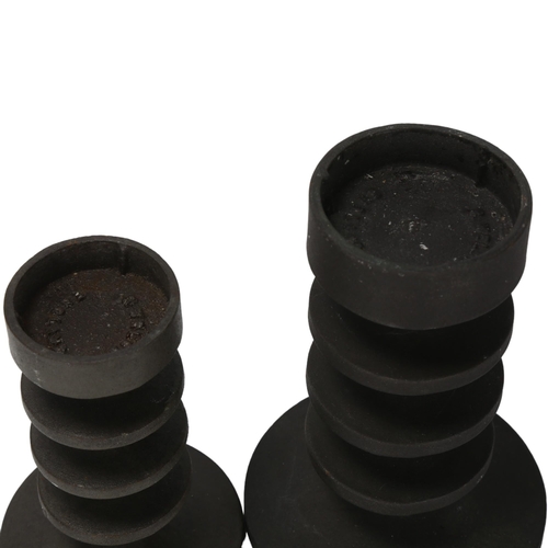 64 - ROBERT WELCH, a pair of 1970s cast iron candlesticks, Design Centre and makers labels, tallest 17cm