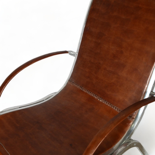 7 - A leather and aluminium lounge chair attributed to RUDOLF SZEDLECZKY, height 95cm, width 66cm