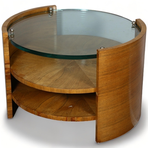 71 - Attributed JACQUES ADNET, an Art Deco 2 tier walnut and glass coffee table, the thick glass held by ... 