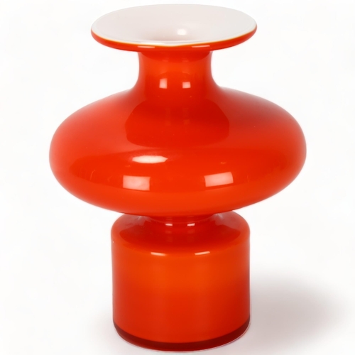 90 - PER LUTKEN for Holmegaard, Denmark, a red cased vase from the Carnaby range, height 15cm