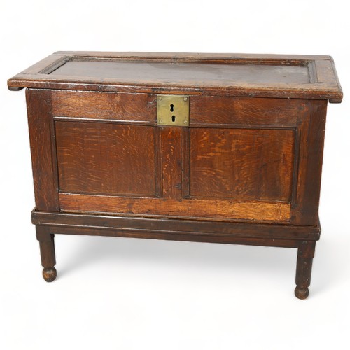 2142 - An early 18th century oak coffer on stand, height 70cm, top 98 x 45cm