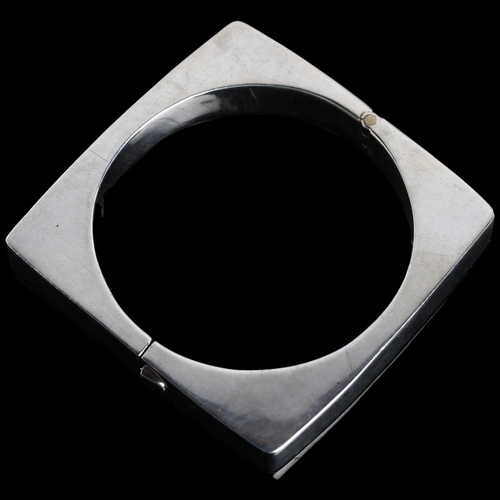 1388 - TAXCO - a Mexican modernist sterling silver geometric hinged bangle, square outer form, band width 9... 