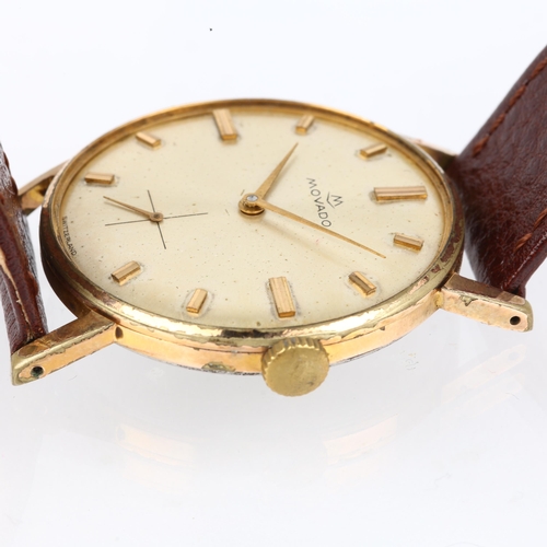 1029 - MOVADO - a gold plated stainless steel mechanical wristwatch, ref. 1031, silvered dial with gilt bat... 