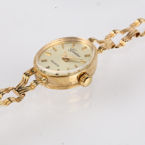 1038 - GENEVE - a lady's 9ct gold quartz bracelet watch, champagne dial with baton hour markers, dauphine h... 