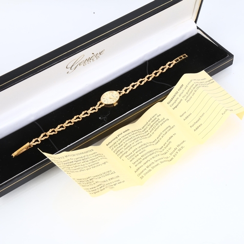 1038 - GENEVE - a lady's 9ct gold quartz bracelet watch, champagne dial with baton hour markers, dauphine h... 