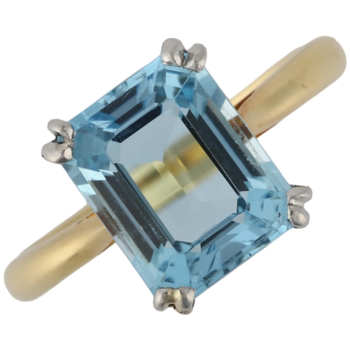 1105 - A solitaire aquamarine ring, late 20th century, centrally claw set with 3ct octagonal step-cut aquam... 