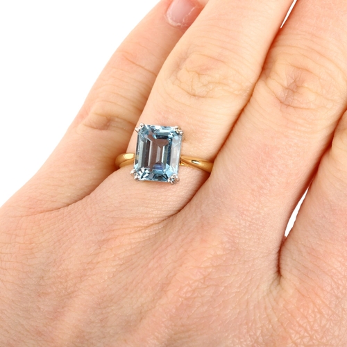 1105 - A solitaire aquamarine ring, late 20th century, centrally claw set with 3ct octagonal step-cut aquam... 