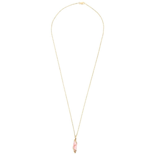 1106 - A Continental pink tourmaline pendant necklace, the long marquise-cut tourmaline within wirework fra... 