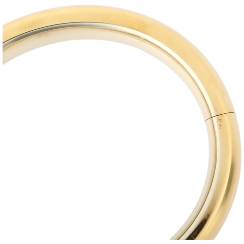 1108 - POMELLATO - an Italian 18ct gold 'Iconica' bangle, plain form with sprung fitting, signed Pomellato,... 