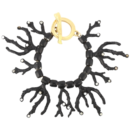 1110 - YVES SAINT LAURENT - a Vintage black enamel and rhinestone 'Coral' bracelet, designed by Robert Goos... 